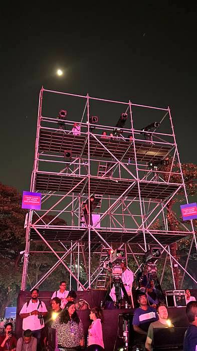 Scaffolding camera and broadcast tower at night