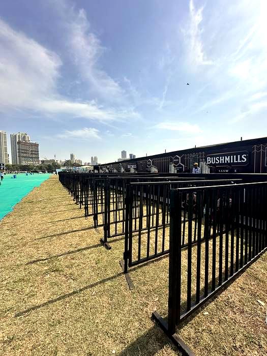 Queue management barricade systems at a festival